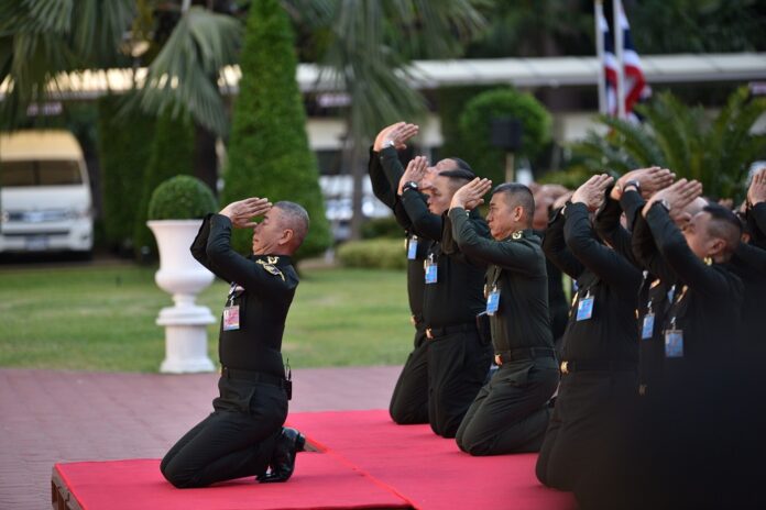 Army chief Gen. Apirat Kongsompong and his officers swear oaths of loyalty on March 7, 2019, in front of a statue of King Rama V at army headquarters in Bangkok.