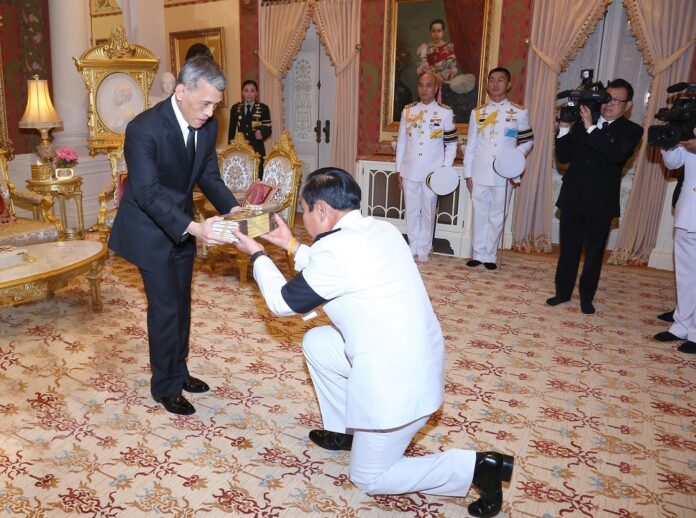 His Majesty the King in an audience with junta chairman Prayuth Chan-ocha on Aug. 13, 2017.