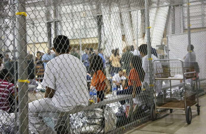 Immigration Separating Families In this June 17, 2018 file photo provided by U.S. Customs and Border Protection, people who've been taken into custody related to cases of illegal entry into the United States, sit in one of the cages at a facility in McAllen, Texas. Photo: U.S. Customs and Border Protection's Rio Grande Valley Sector via AP
