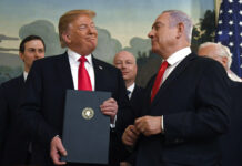 Netanyahu Vows to Annex West Bank Settlements If Re-Elected In this Monday, March 25, 2019 file photo, President Donald Trump smiles at Israeli Prime Minister Benjamin Netanyahu, right, after signing a proclamation in the Diplomatic Reception Room at the White House in Washington. Photo: Susan Walsh / Associated Press