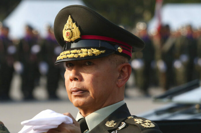 In this Friday, Jan. 18, 2019, file photo, Thai army chief Gen. Apirat Kongsompong reviews the guard of honor during the Royal Thai Armed Forces Day ceremony at a military base in Bangkok, Thailand. Photo: Sakchai Lalit / AP