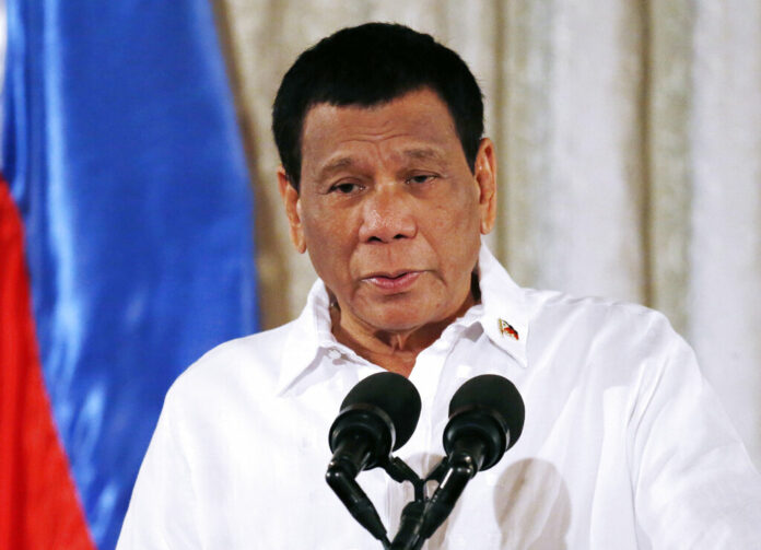 In this Oct. 9, 2018, file photo, Philippine President Rodrigo Duterte addresses congressmen and Government officials during the presentation of Republic Act bills in a ceremony at the Presidential Palace in Manila, Philippines. Photo: Bullit Marquez / Associated Press