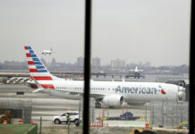 American Airlines Extends Max-Caused Cancellations In a March 13, 2019 file photo, an American Airlines Boeing 737 MAX 8 sits at a boarding gate at LaGuardia Airport in New York. Photo: Frank Franklin II / Associated Press