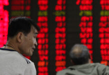 Global Shares Mixed After China-US Trade Talks Show Progress Investors monitor stock prices Monday at a brokerage house in Beijing. Photo: Andy Wong / Associated Press