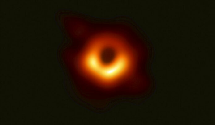 This image released Wednesday, April 10, 2019, by Event Horizon Telescope shows a black hole. Scientists revealed the first image ever made of a black hole after assembling data gathered by a network of radio telescopes around the world. Image: Event Horizon Telescope Collaboration / Maunakea Observatories via AP