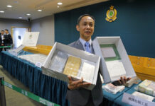 Hong Kong Customs Seizes Massive Cocaine Haul Head of Customs Drug Investigation Bureau Hui Wai-ming holds the seized cocaine during a news conference in Hong Kong, Thursday, April 4, 2019. Photo: Kin Cheung / Associated Press