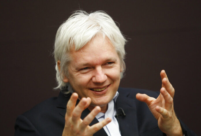 In this Dec. 1, 2011, file photo, WikiLeaks founder Julian Assange gestures as he speaks during a news conference in central London. Photo: Lefteris Pitarakis / Associated Press