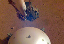 Mars Lander Picks up What’s Likely 1st Detected Marsquake This photo made available by NASA on Tuesday, April 23, 2019 shows the InSight lander's domed wind and thermal shield which covers a seismometer on the 110th Martian day, or sol, of the mission. Photo: NASA / JPL-Caltech via AP