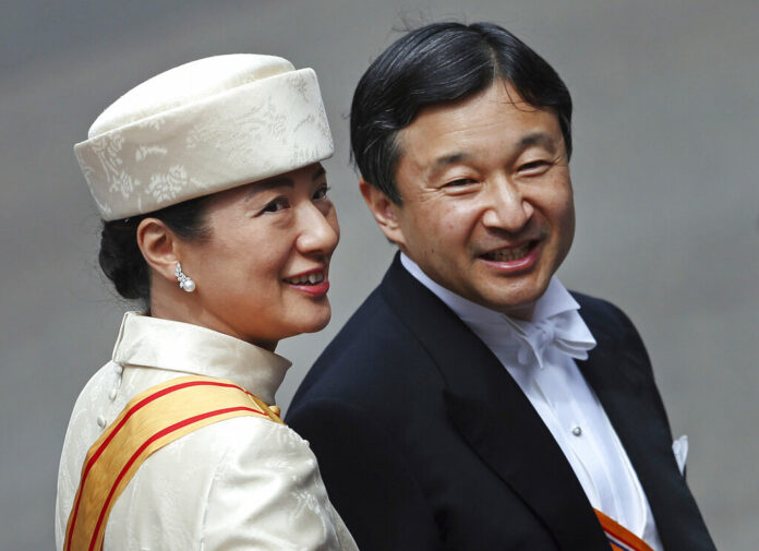 Japan New Emperor In this April 30, 2013, file photo, Japan's Crown Prince Naruhito and Crown Princess Masako arrive at the Nieuwe Kerk or New Church in Amsterdam, The Netherlands, for the inauguration of King Willem-Alexander. Photo: Dusan Vranic / Associated Press