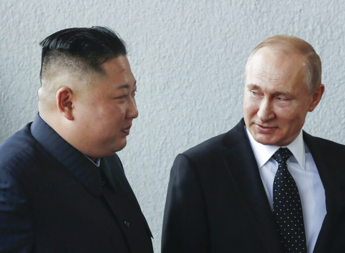 Russian President Vladimir Putin and North Korea's leader Kim Jong Un walk during their meeting in Vladivostok, Russia, Thursday, April 25, 2019. Photo: Sergei Ilnitsky / Pool Photo via AP