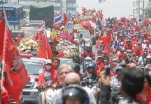 Redshirts Mark April Crackdown, Pledge Fight for Justice