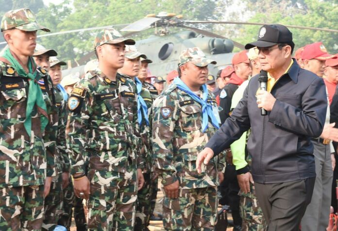 Gen. Prayuth Chan-ocha addresses soldiers Tuesday during a visit at an army camp in Chiang Mai province.