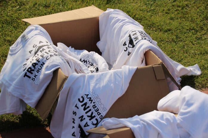 Fundraiser shirts sold by Vision Beyond Borders, whose three missionaries were recently deported by Laotian authorities. Image: Vision Beyond Borders