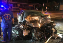 46 Road Deaths on Songkran’s 1st ‘Dangerous Day’ A rescue worker stands near the scene of a fatal car accident early Thursday morning in Kanchanaburi province.