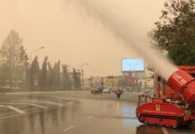Air is So Dirty in Northern Thailand, Leader Flies to See It A fire-fighting equipment sprays water onto a street Sunday in Chiang Rai city as heavy smog is seen covering the area.