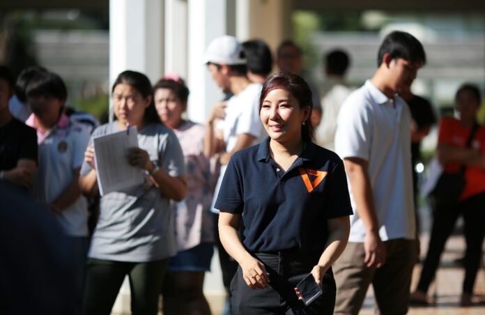 Future Forward MP candidate Sawika Limpasuwanna reacts to the result during a recount in Nakhon Pathom province on April 28, 2019.