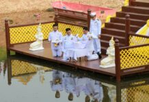 Kingdom Prepares for Coronation’s Holy Water Ritual The Phitsanulok Governor, right, leads the Thursday rehearsal to draw holy water for the coronation ceremony.