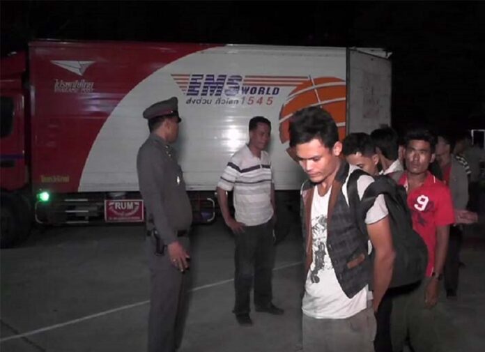 In an image provided by police, migrants are led out of a mail truck in Satun province on May 14, 2019.