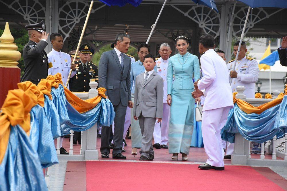 A file photo of Queen Suthida with His Majesty the King and Prince Dipangkorn.