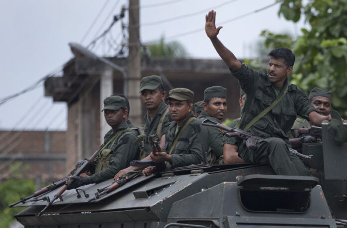 Soldiers return to their base following an operation searching for explosives and suspects tied to a local group of Islamic State militants in Kalmunai, Sri Lanka, Monday, April 29, 2019. Photo: Gemunu Amarasinghe / AP