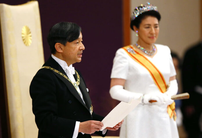 Japan's new Emperor Naruhito, accompanied by new Empress Masako, makes his first address during a ritual after succeeding his father¬†Akihito at Imperial Palace in Tokyo, Wednesday, May 1, 2019. Photo: Japan Pool / AP