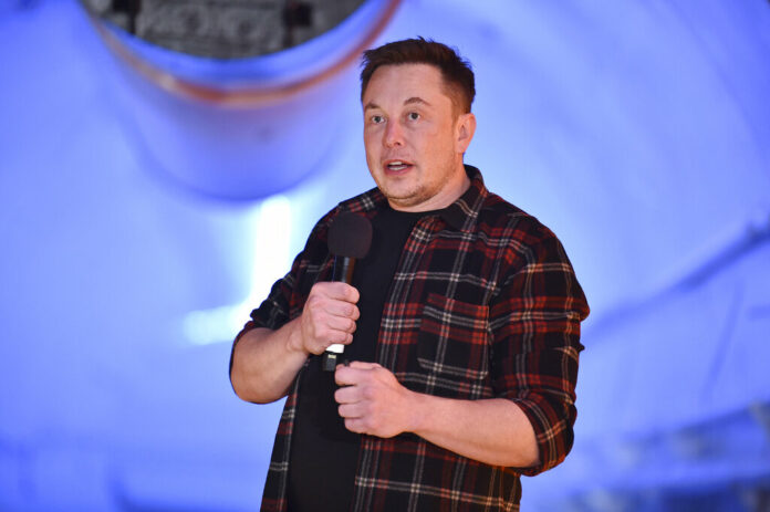 In this Tuesday, Dec. 18, 2018 file photo, Elon Musk, co-founder and chief executive officer of Tesla Inc., speaks during an unveiling event for the Boring Co. Musk will have to go to trial to defend himself for mocking a British diver as a pedophile in a verbal sparring match that unfolded last summer after the underwater rescue of youth soccer players trapped in a Thailand cave. A federal court judge in Los Angeles set an Oct. 22, 2019, trial date in a Friday, May 10, court filing that rejected Musk's attempt to dismiss a defamation lawsuit filed by British diver Vernon Unsworth. Photo: Robyn Beck / Pool Photo via AP