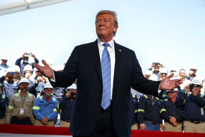 In this May 14, 2019, photo, President Donald Trump arrives to speak on energy infrastructure at the Cameron LNG export facility in Hackberry, La. Photo: Evan Vucci / AP In this May 14, 2019, photo, President Donald Trump arrives to speak on energy infrastructure at the Cameron LNG export facility in Hackberry, La. Photo: Evan Vucci / AP