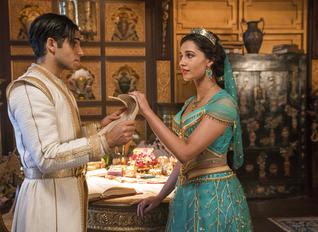 This image released by Disney shows Mena Massoud as Aladdin, left, and Naomi Scott as Jasmine in Disney's live-action adaptation of the 1992 animated classic "Aladdin." Photo: Daniel Smith / Disney via AP