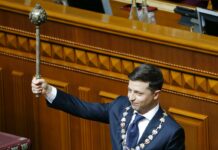 Ukraine’s New Leader Gets Sworn In, Dissolves Parliament Ukrainian new President Volodymyr Zelenskiy holds the Ukrainian symbols of power during his inauguration ceremony in Kiev, Ukraine, Monday, May 20, 2019. Television star Volodymyr Zelenskiy has been sworn in as Ukraine's next president after he beat the incumbent at the polls last month. The ceremony was held at Ukrainian parliament in Kiev on Monday morning. Photo: Efrem Lukatsky / AP