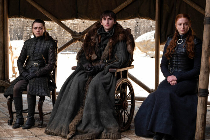 This image released by HBO shows from left to right Maisie Williams, Isaac Hempstead Wright and Sophie Turner in a scene from the final episode of This image released by HBO shows from left to right Maisie Williams, Isaac Hempstead Wright and Sophie Turner in a scene from the final episode of