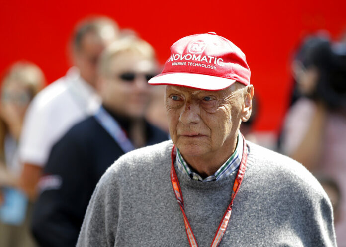 In this July 7, 2018, file photo, former Formula One World Champion Niki Lauda of Austria walks in the paddock before the third free practice at the Silverstone racetrack, Silverstone, England. Photo: Luca Bruno / AP