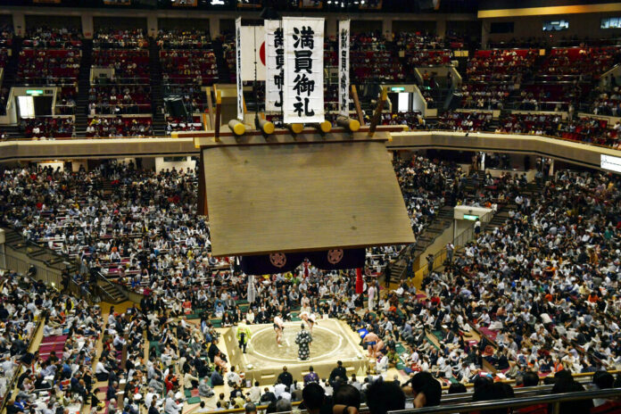In this May 12, 2019, photo, banners thanking for a sellout crowd are displayed on the first day of Summer Grand Sumo Tournament in Tokyo. Plans for U.S. President Donald Trump to check out the ancient Japanese sport of sumo wrestling during a state visit are raising security issues for organizers. Photo: Yoshitaka Sugawara / Kyodo News via AP