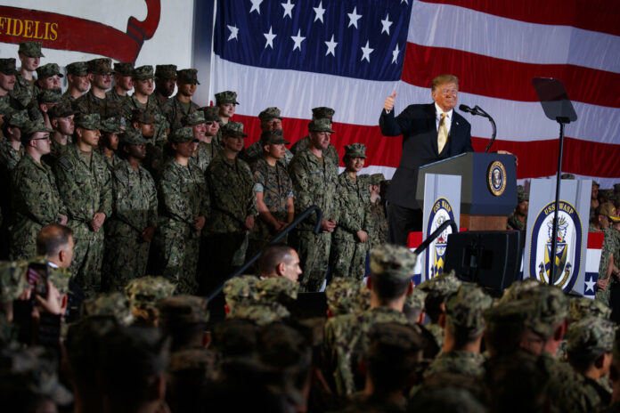 President Donald Trump speaks to troops at a Memorial Day event aboard the USS Wasp, Tuesday, May 28, 2019, in Yokosuka, Japan. Photo: Evan Vucci / AP