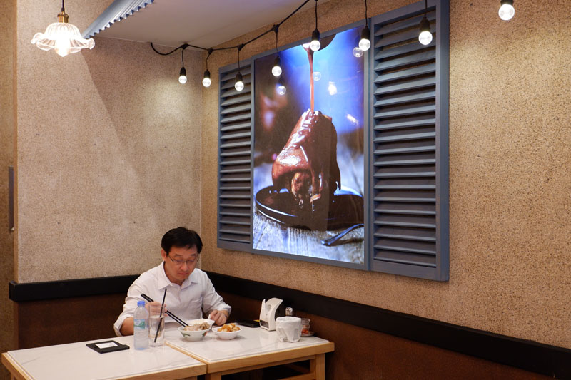 A customer in Song Fa Bak Kut Teh at CentralWorld.