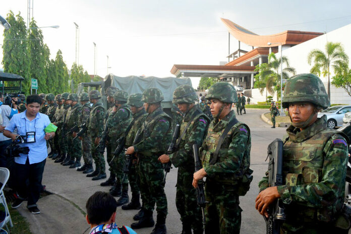Soldiers face off with reporters moments after the military stages a coup on May 22, 2014. Soldiers face off with reporters moments after the military stages a coup on May 22, 2014.