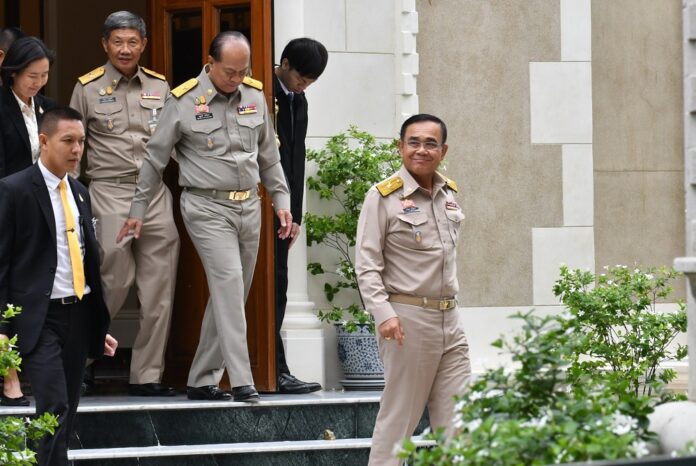 Junta chairman Prayuth Chan-ocha a smiles in a rare good mood at Government House on May 13, 2019.