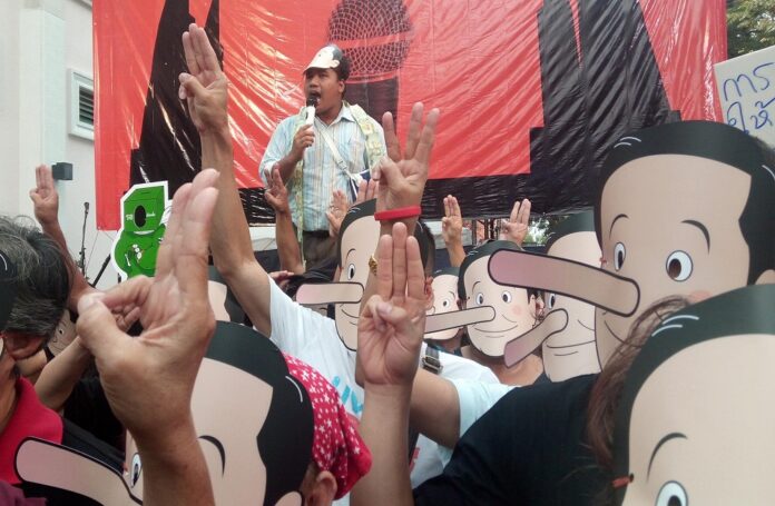 Protesters wear Pinocchio masks to mock junta chairman Prayuth Chan-ocha on Feb. 24, 2018.