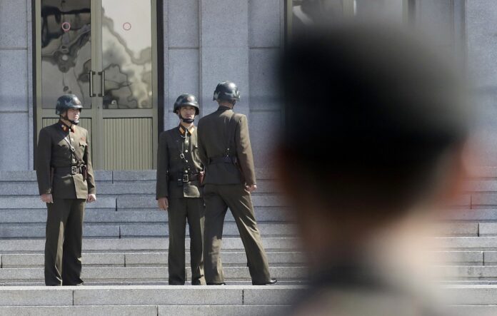 A file photo of North Korean officers at the Panmunjom in the Demilitarized Zone (DMZ). Image: Associated Press
