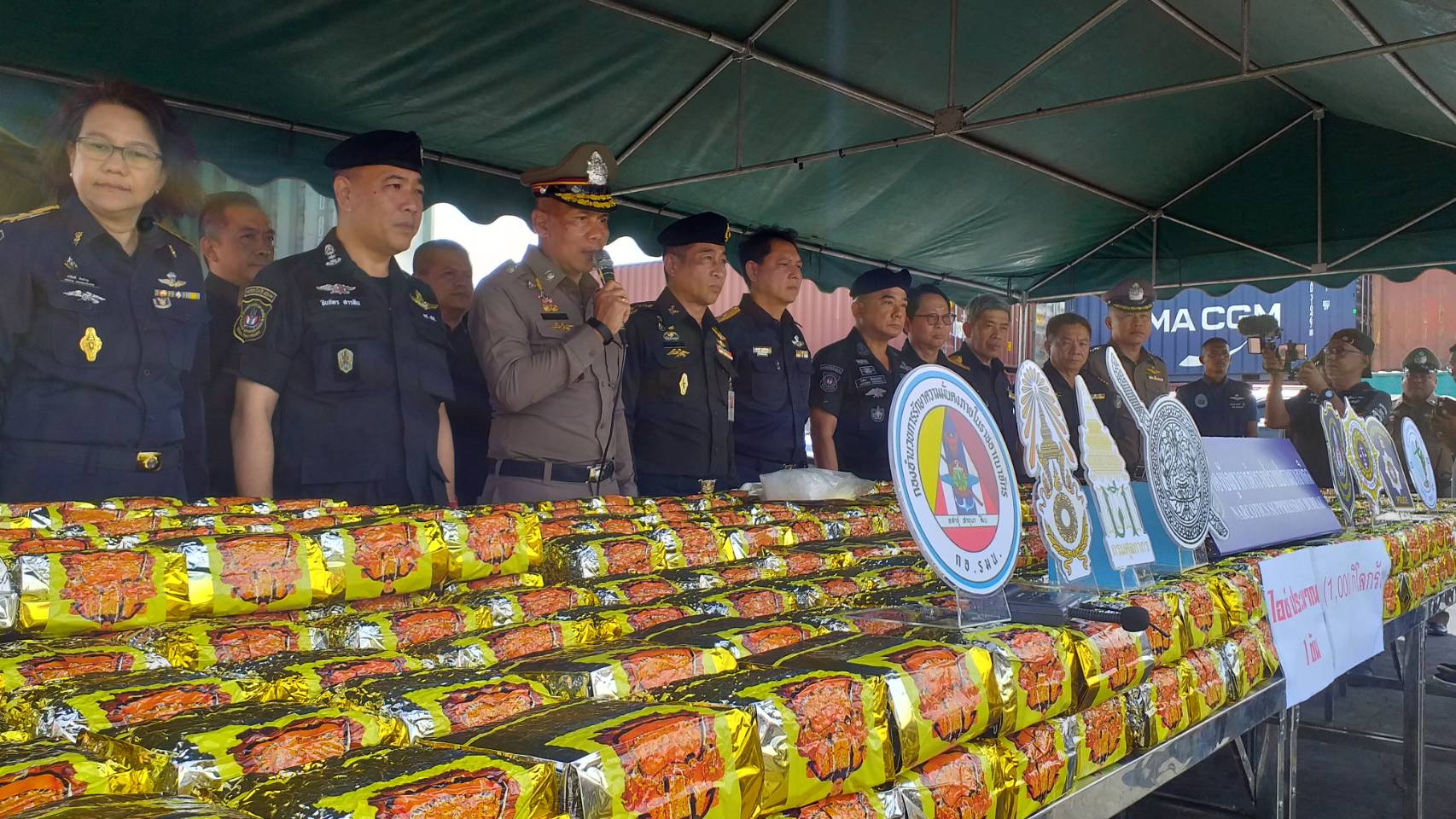 Officials holding a news conference of the arrest at a Chon Buri port on June 16.