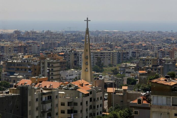 This Monday, June 24, 2019 photo, shows a church in the village of Hadat, where only Christians can rent or buy property, near Beirut, Lebanon. (AP Photo/Bilal Hussein)