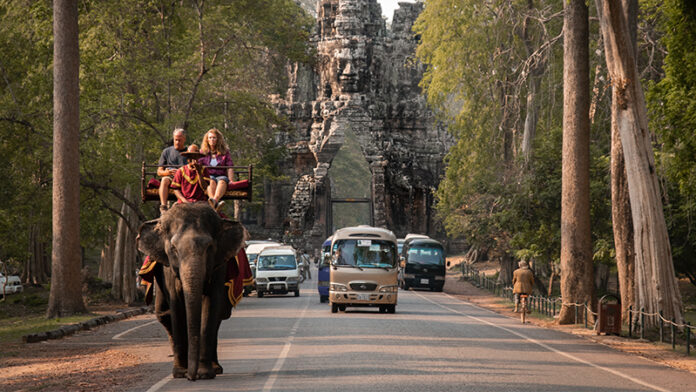 Tourists taking an elephant ride near Angkor Wat in April 2019. Photo: Moving Animals / Courtesy Tourists taking an elephant ride near Angkor Wat in April 2019. Photo: Moving Animals / Courtesy