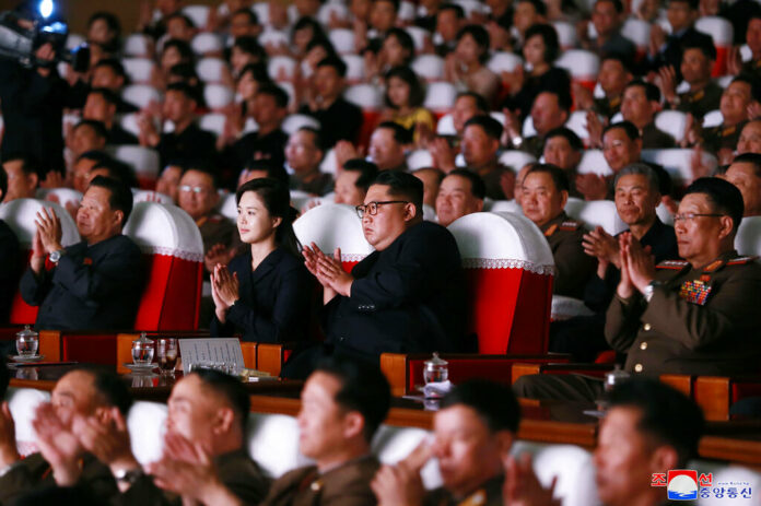 In this June 2, 2019, photo provided on Monday, June 3, 2019, by the North Korean government, North Korean leader Kim Jong Un, center right, and his wife Ri Sol Ju, center left, clap hands in a musical performance by the wives of Korean People's Army officers in North Korea. Photo: Korean Central News Agency / Korea News Service via AP In this June 2, 2019, photo provided on Monday, June 3, 2019, by the North Korean government, North Korean leader Kim Jong Un, center right, and his wife Ri Sol Ju, center left, clap hands in a musical performance by the wives of Korean People's Army officers in North Korea. Photo: Korean Central News Agency / Korea News Service via AP