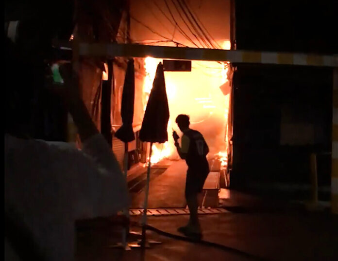 This Sunday, June 2, 2019 image taken from video provided by Younes Parvin shows a fire at Bangkok's Chatuchak weekend market, Thailand. Thai authorities are investigating an after-hours fire that roared through Chatuchak market, destroying dozens of the small shops crammed inside one of Asia's most popular bazaars. Photo: Younes Parvin / AP