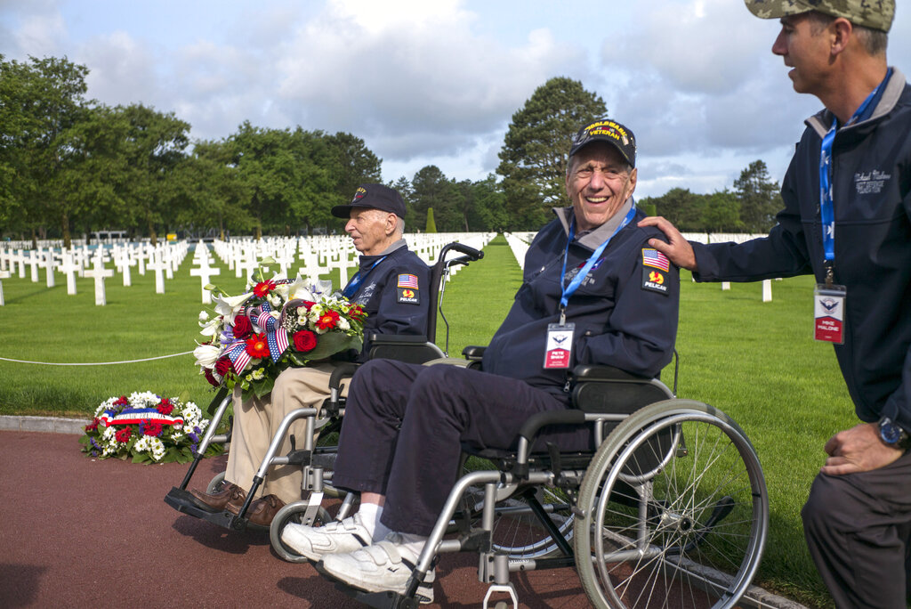 World War II veteran Pete Shaw, center, from Pennsylvania, visits the Normandy American Cemetery in Colleville-sur-Mer, Normandy, France, Monday, June 3, 2019. France is preparing to mark the 75th anniversary of the D-Day invasion which took place on June 6, 1944. Photo: Rafael Yaghobzadeh / AP