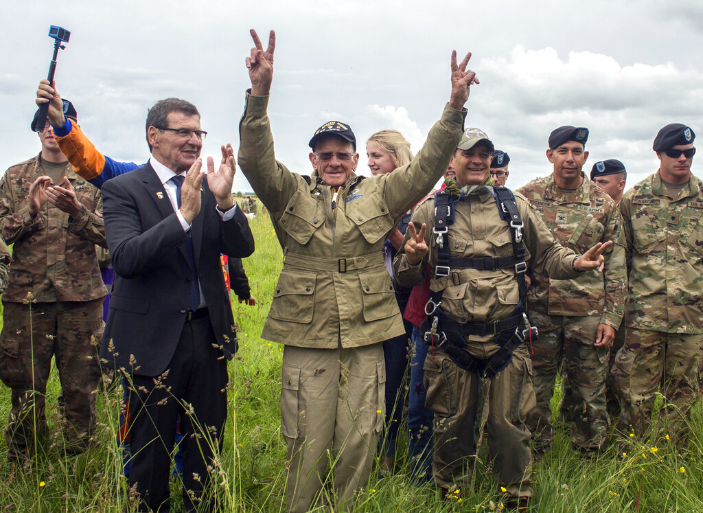 U.S. World War II D-Day veteran Tom Rice, from Coronado, CA, after parachuting in a tandem jump into a field in Carentan, Normandy, France, Wednesday, June 5, 2019. Approximately 200 parachutists participated in the jump over Normandy on Wednesday, replicating a jump made by U.S. soldiers on June 6, 1944 as a prelude to the seaborne invasions on D-Day. Photo: Rafael Yaghobzadeh / AP