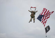 ‘Woo-Hoo!’ at 97, D-Day Veteran Parachutes Into Normandy U.S. World War II D-Day veteran Tom Rice, from Coronado, CA, parachutes in a tandem jump into a field in Carentan, Normandy, France, Wednesday, June 5, 2019. Approximately 200 parachutists participated in the jump over Normandy on Wednesday, replicating a jump made by U.S. soldiers on June 6, 1944 as a prelude to the seaborne invasions on D-Day. Photo: AP