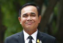 Prayuth Has Little to Say About Staying in Power Thailand's Prime Minister Prayuth Chan-ocha smiles as he talks to reporters before meeting at government house in Bangkok, Thailand, Thursday, June 6, 2019. Thailand's Parliament elected 2014 coup leader Prayuth Chan-ocha as prime minister in a vote Wednesday that helps ensure the military's sustained dominance of politics since the country became a constitutional monarchy nearly nine decades ago. Photo: Sakchai Lalit / AP