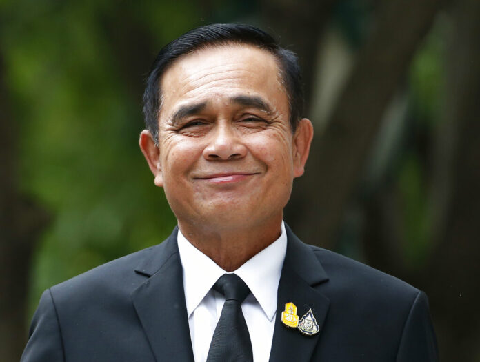 Thailand's Prime Minister Prayuth Chan-ocha smiles as he talks to reporters before meeting at government house in Bangkok, Thailand, Thursday, June 6, 2019. Thailand's Parliament elected 2014 coup leader Prayuth Chan-ocha as prime minister in a vote Wednesday that helps ensure the military's sustained dominance of politics since the country became a constitutional monarchy nearly nine decades ago. Photo: Sakchai Lalit / AP