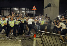 Extradition Bill Pushes Hong Kong to a Political Crisis Police officers use pepper spray against protesters in a rally against the proposed amendments to the extradition law at the Legislative Council in Hong Kong during the early hours of Monday, June 10, 2019. The extradition law has aroused concerns that this legislation would undermine the city's independent judicial system as it allows Hong Kong to hand over fugitives to the jurisdictions that the city doesn't currently have an extradition agreement with, including mainland China, where a fair trial might not be guaranteed. Photo: Vincent Yu / AP