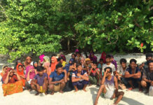 65 Rohingya Muslims Found Shipwrecked in Satun Rohingya sits on a beach at Rawi island in Satun province Southern of Thailand Tuesday, June 11, 2019. Thai officials say they have discovered 65 ethnic Rohingya Muslim refugees who were shipwrecked and stranded in southern Thailand. Photo: Department of National Parks Wildlife and Plant Conservation via AP